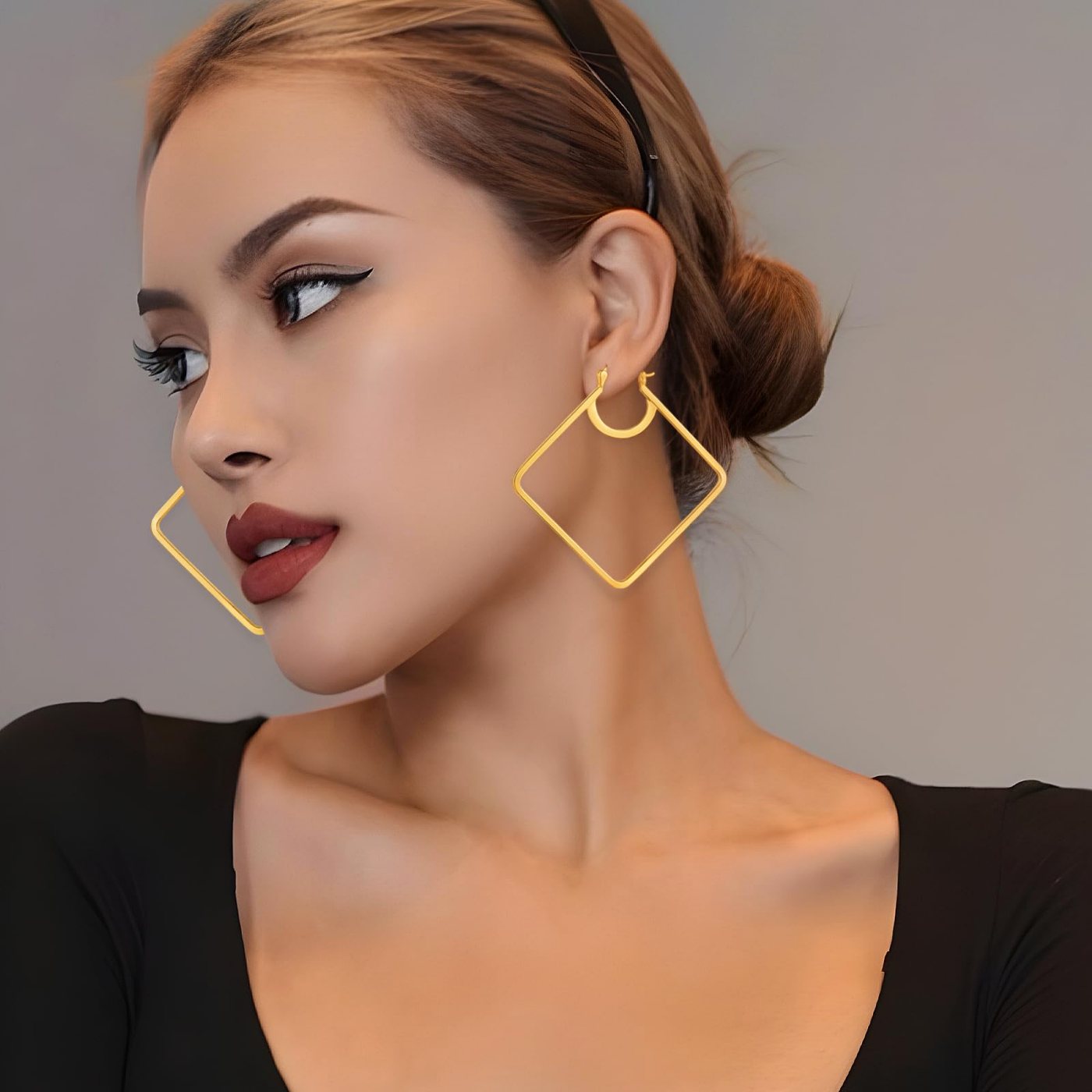 YUJIE square hoops worn with a white shirt